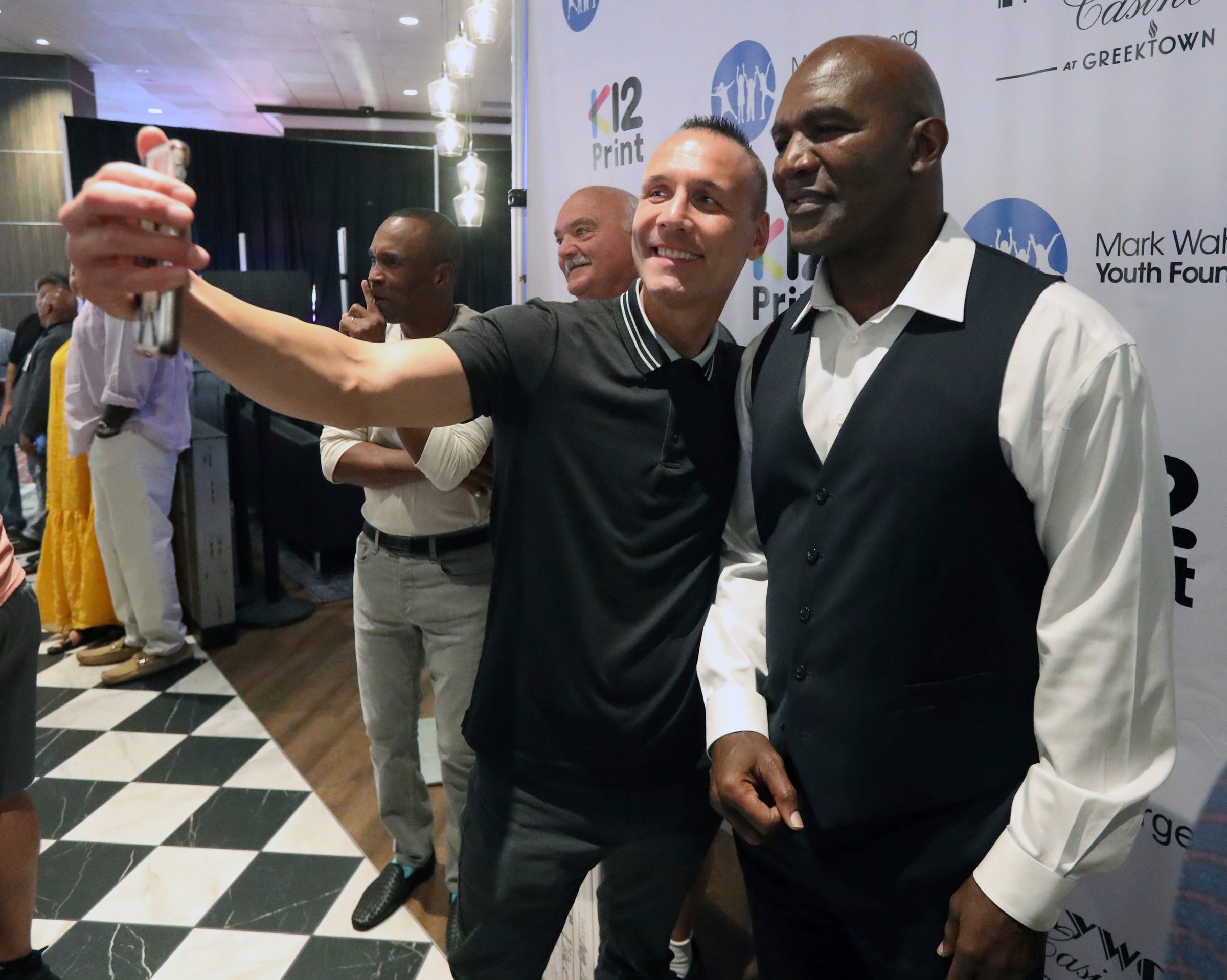 Evander Holyfield, Lennox Lewis