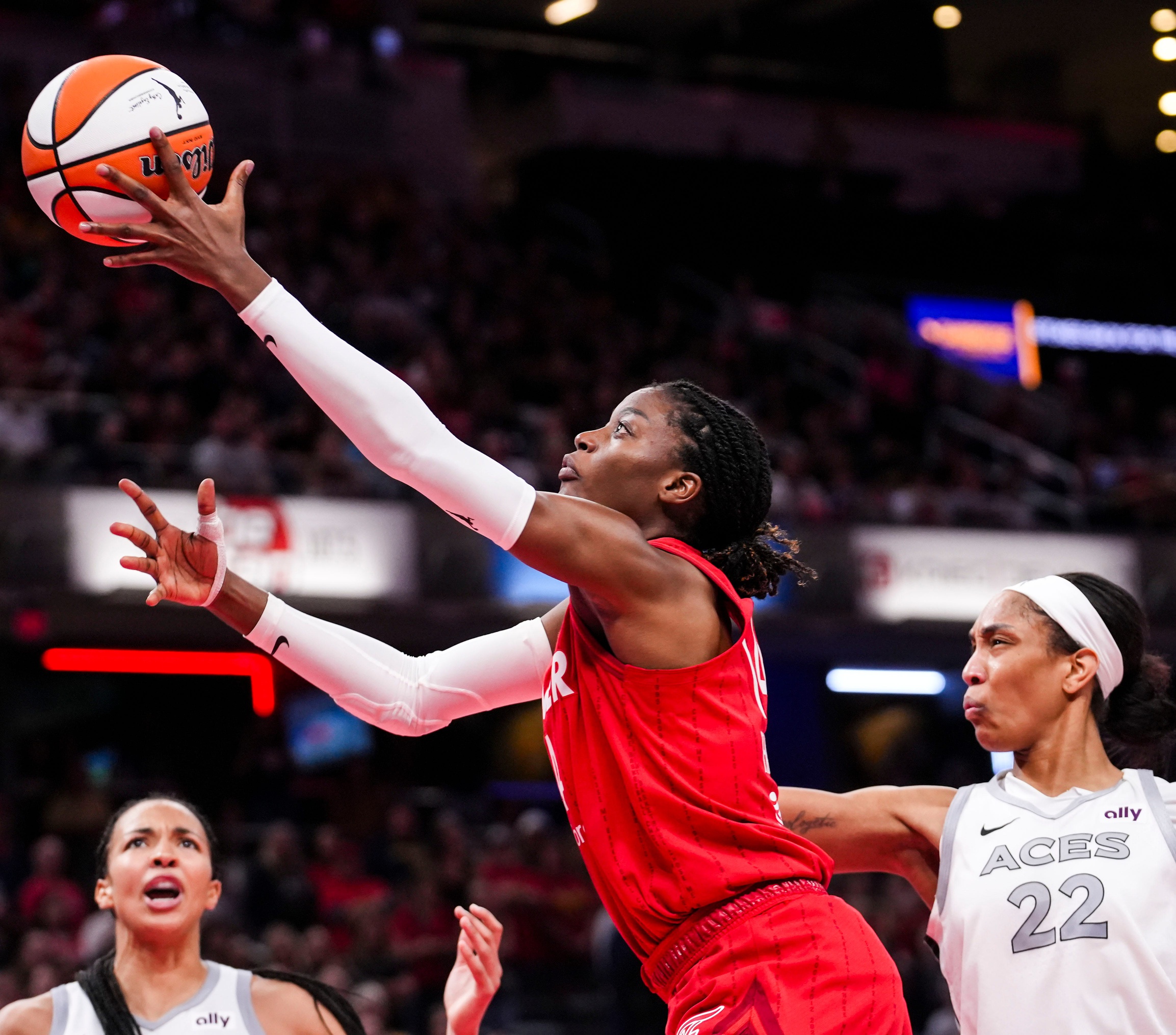 Indiana Fever center Temi Fagbenle (14) goes up for a shot Friday, Sept. 13, 2024, during a game between the Indiana Fever and the Las Vegas Aces on Friday, Sept. 13, 2024, at Gainbridge Fieldhouse in Indianapolis. The Aces defeated the Fever, 78-74.