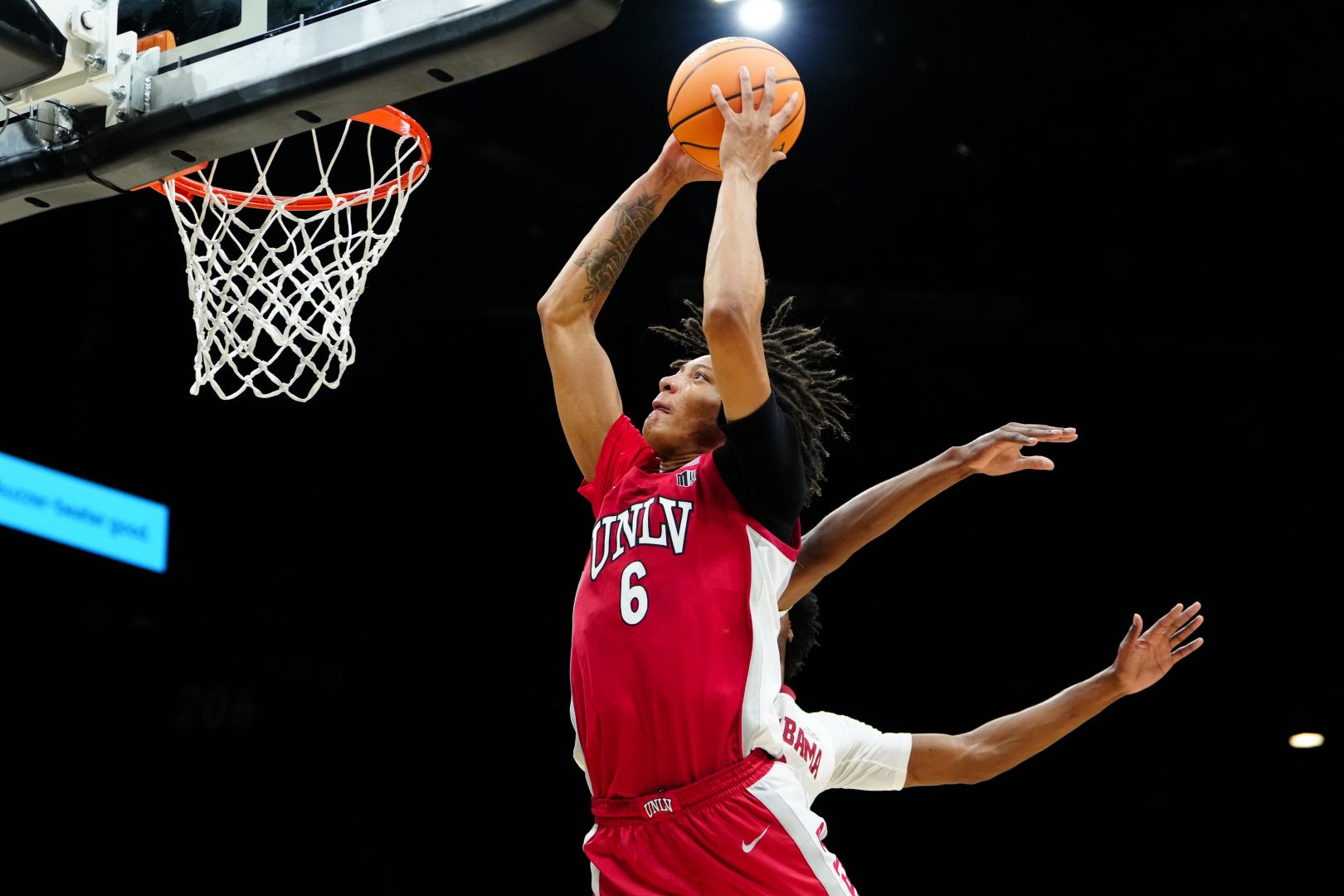 UNLV forward Tyrin Jones dunks against Alabama during the Players Era Championship in Las Vegas.