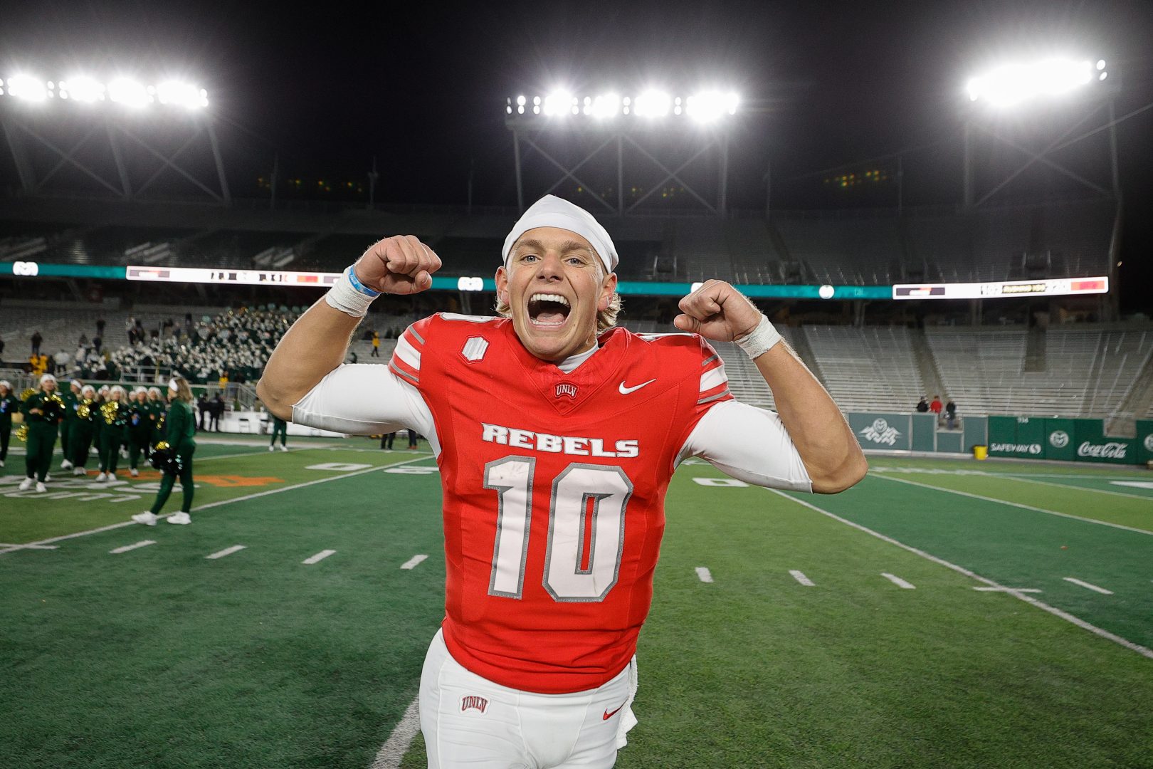 UNLV quarterback Anthony Colandrea flexes and celebrates on the field after a road win against Colorado State at Canvas Stadium on Nov. 8, 2025.