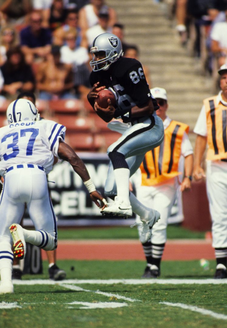 File photo: Los Angeles Raiders wide receiver Mervyn Fernandez (86) catches a pass against the Indianapolis Colts at Los Angeles Memorial Coliseum.