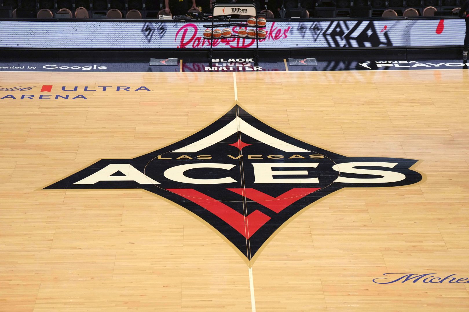 The Las Vegas Aces logo at center court during game one of the 2023 WNBA Semifinals at Michelob Ultra Arena.