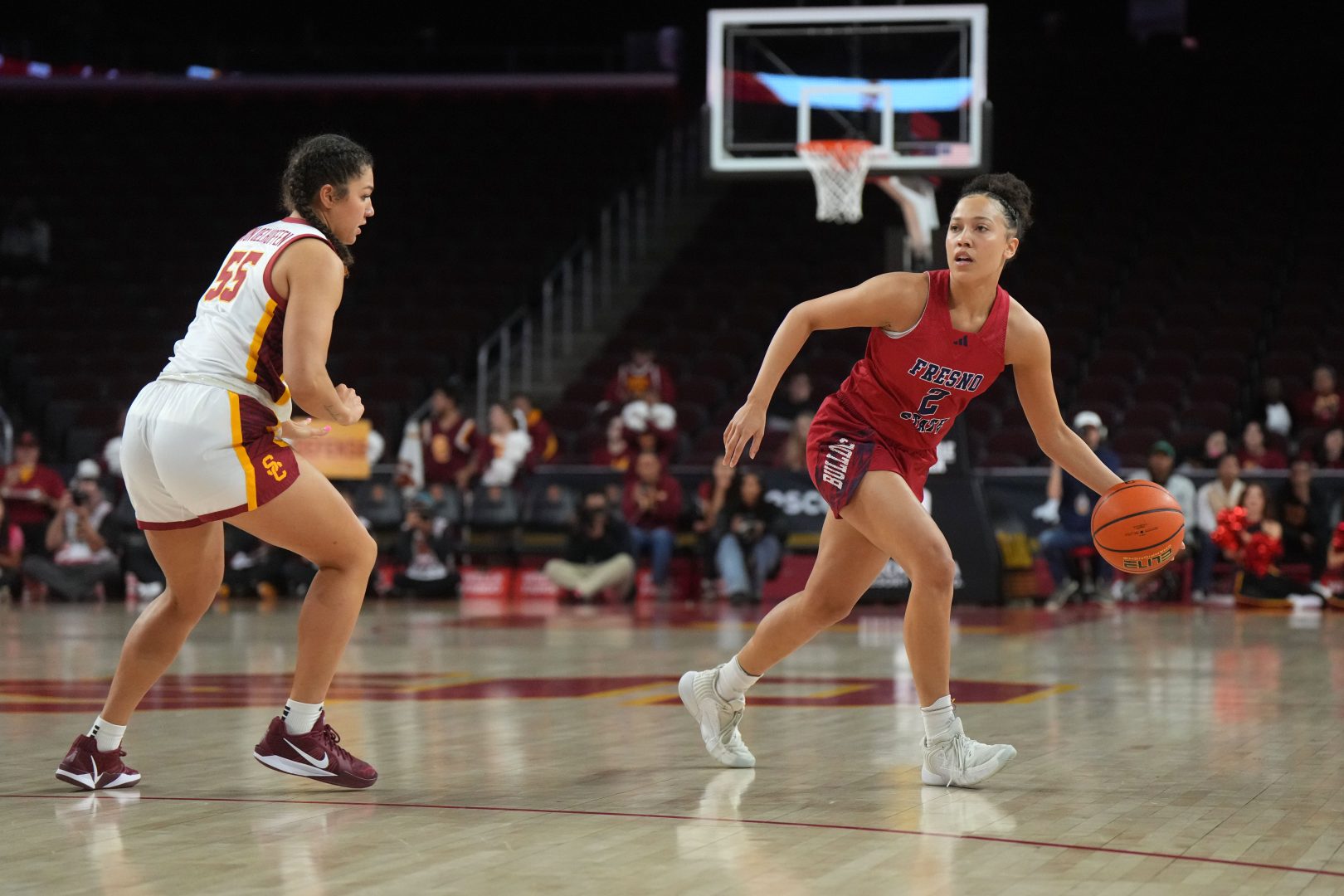 Fresno State Bulldogs guard Mariah Elohim (2) dribbles the ball against Southern California Trojans guard Talia von Oelhoffen (55) in the first half at Galen Center. USC defeated Fresno State 89-40.