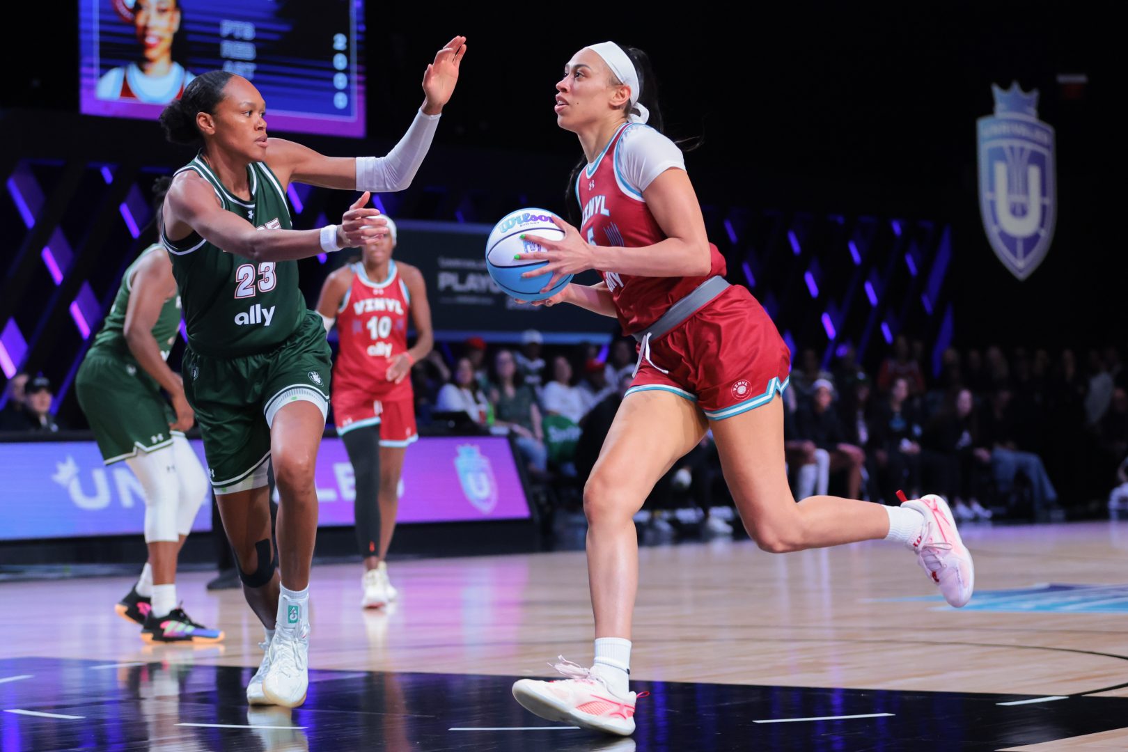 Vinyl BC forward Dearica Hamby (5) drives to the basket against Rose BC forward Azura Stevens (23) during the first quarter of the Unrivaled Championship game at Wayfair Arena.