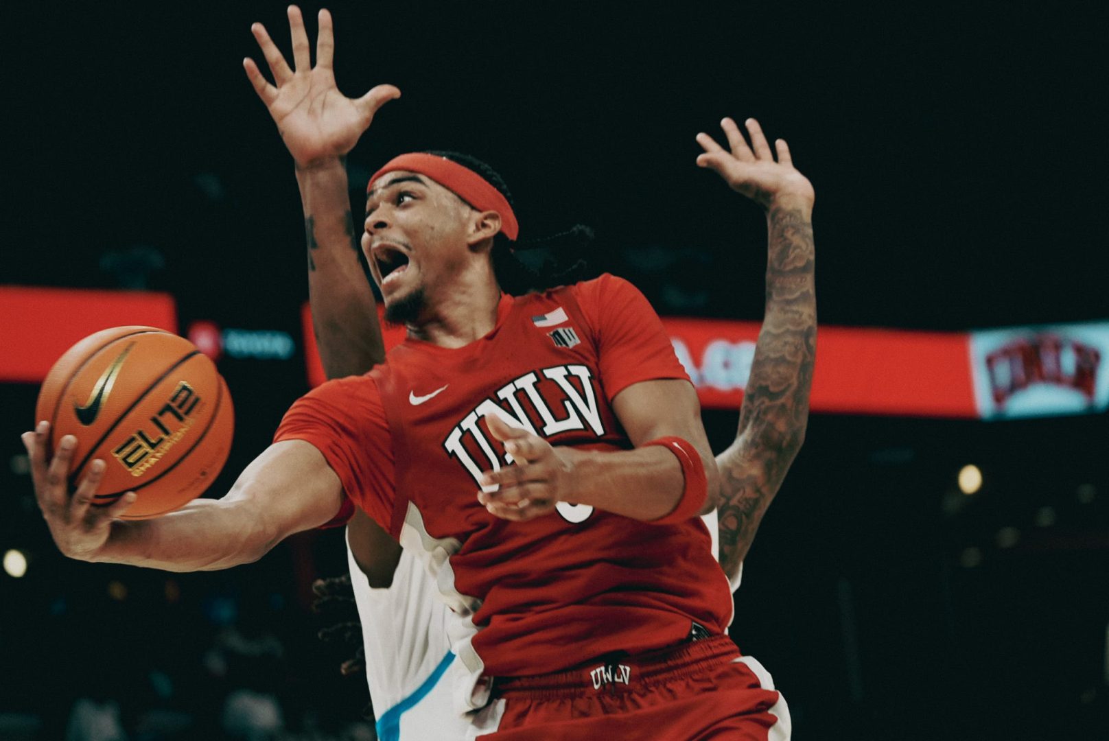 UNLV guard Howie Fleming Jr. (3) drives for a layup vs Memphis on Nov. 16, 2025 at FedExForum in Memphis, Tennessee.