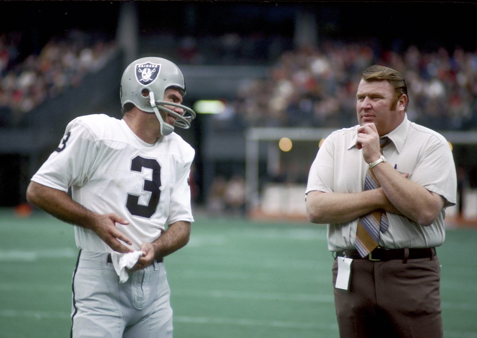 File photo: Oakland Raiders quarterback Daryle Lamonica talks with head coach John Madden during the 1972 AFC Divisional Playoff Game.