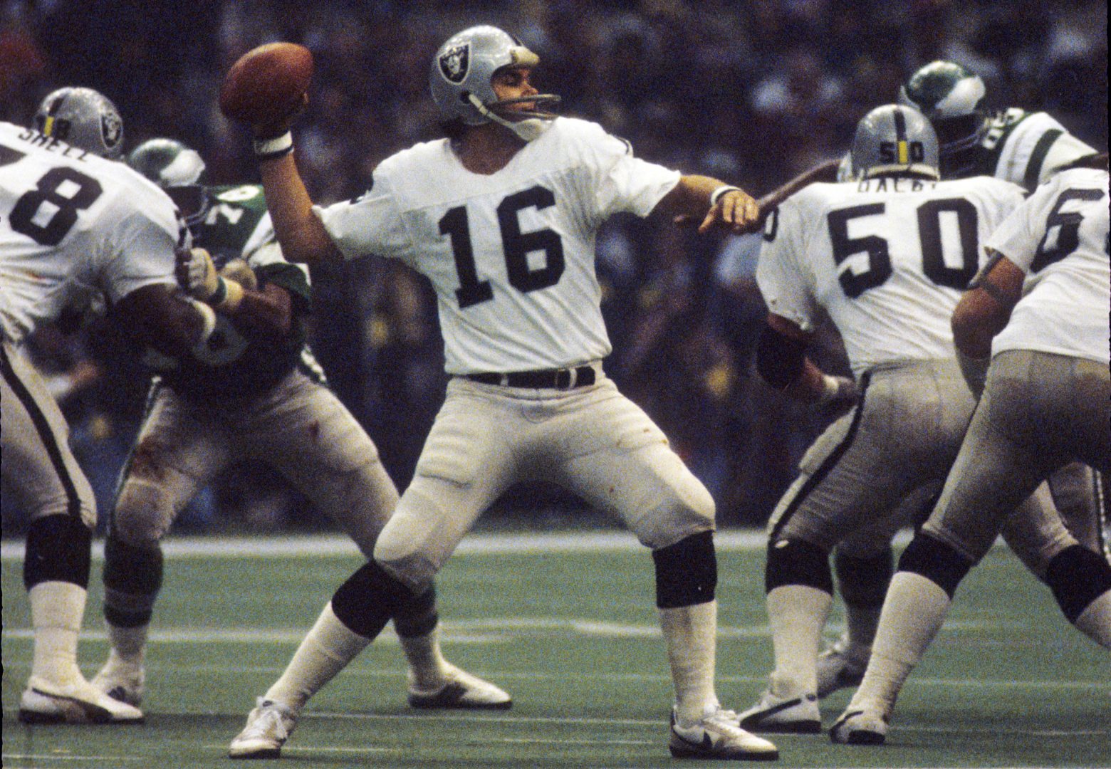 File photo: Oakland Raiders quarterback Jim Plunkett looks to throw against the Philadelphia Eagles in Super Bowl XV.