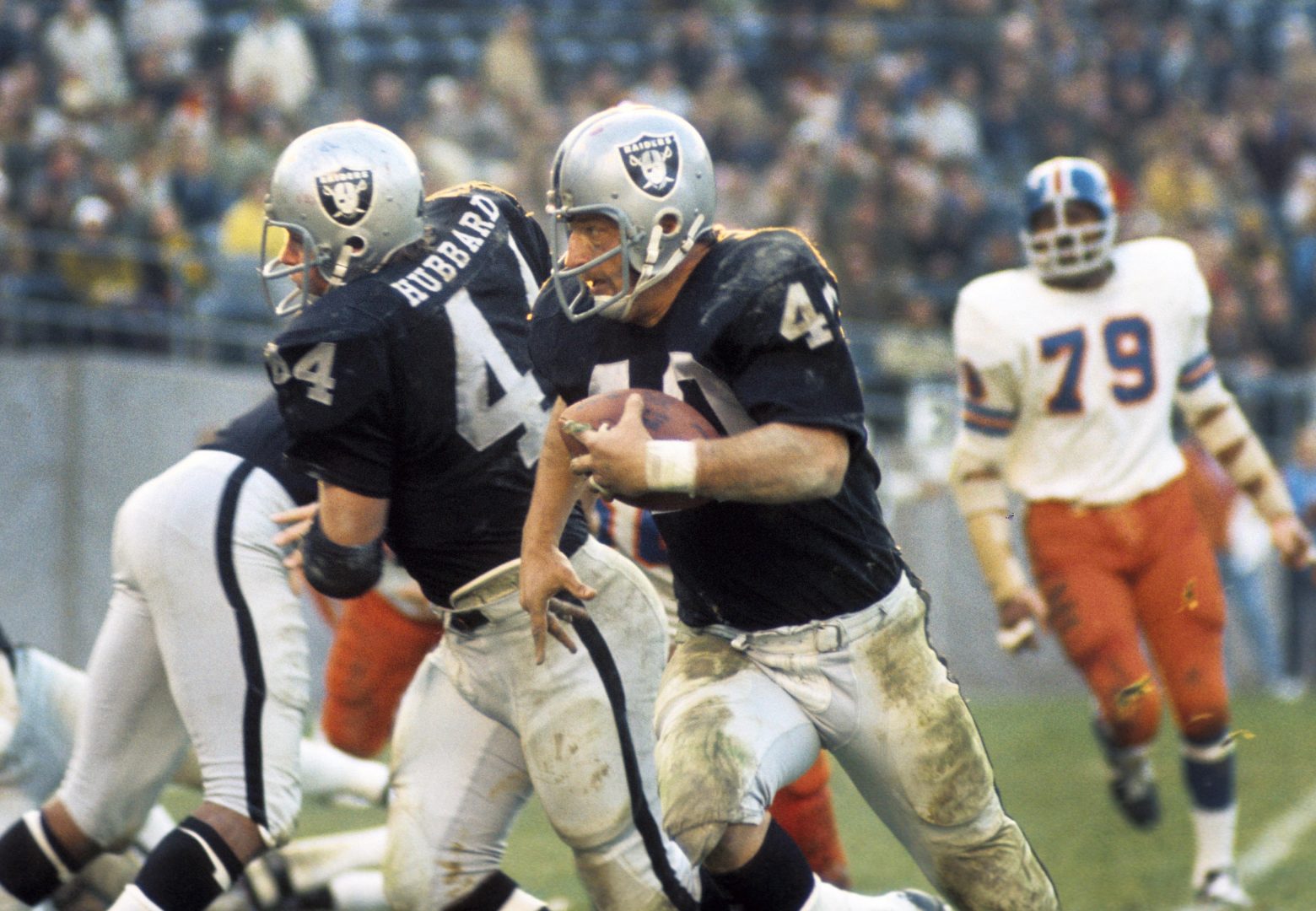 File photo: Oakland Raiders running back Pete Banaszak (40) runs behind Marv Hubbard (44) against the Denver Broncos at Oakland Coliseum.
