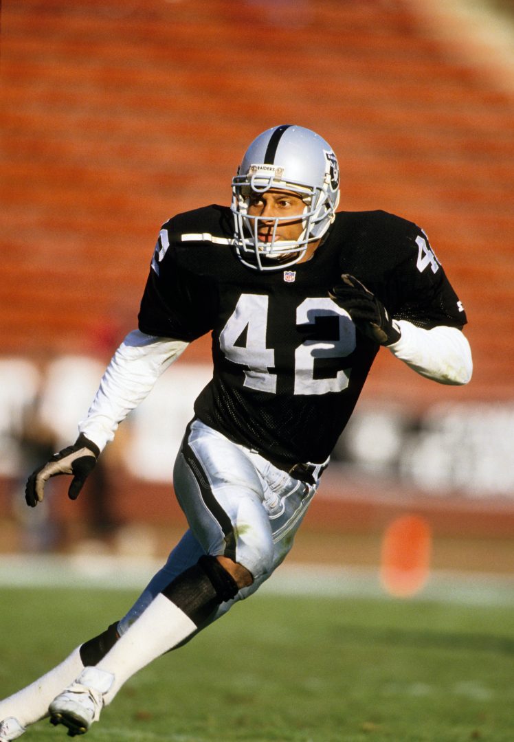 File photo: Los Angeles Raiders safety Ronnie Lott (42) breaks on the play against the San Diego Chargers at the Los Angeles Coliseum.