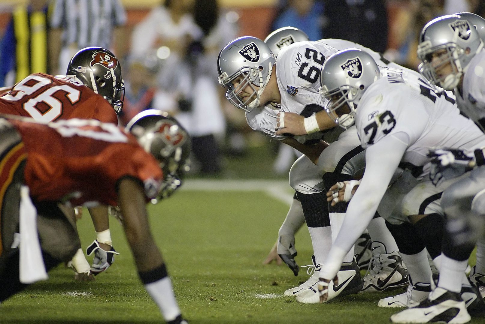 File photo: Oakland Raiders center Adam Treu (62) snaps the ball during Super Bowl XXXVII at Qualcomm Stadium.