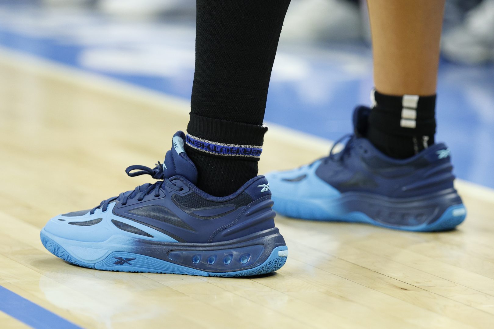 Chicago Sky forward Angel Reese (5) Reebok shoes are seen during the first half of a WNBA game at Wintrust Arena.