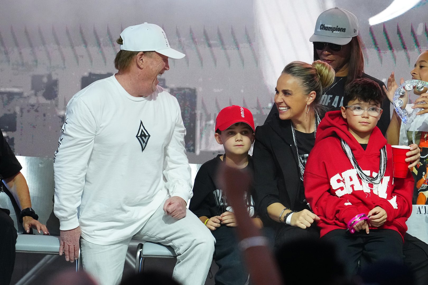 Las Vegas Aces owner Mark Davis laughs with Aces head coach Becky Hammon during the Aces 2025 Championship celebration at Toshiba Plaza.