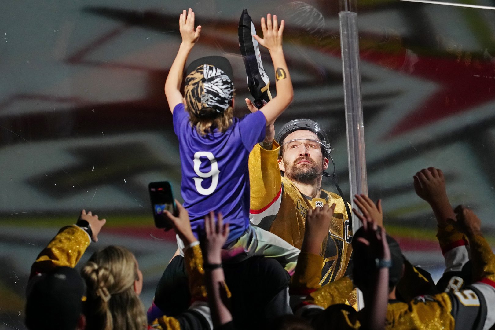 Mark Stone greets a fan after a Golden Knights win at T-Mobile Arena in Las Vegas.