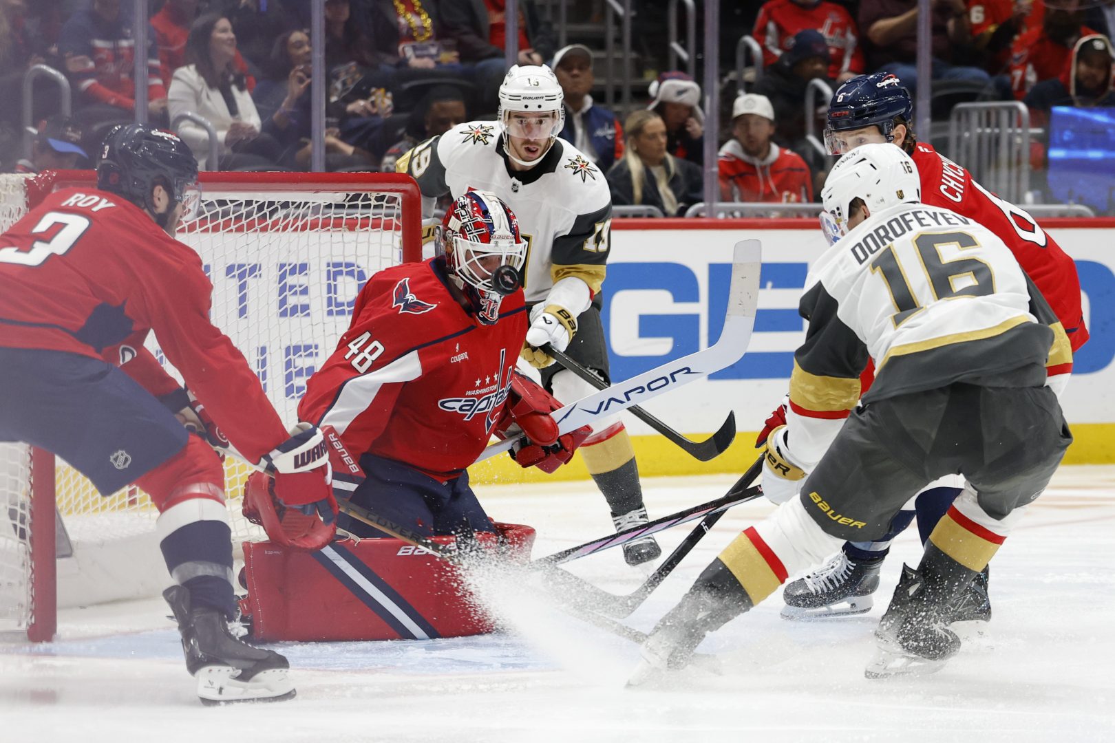 Capitals goalie Logan Thompson makes a second-period save on Golden Knights winger Pavel Dorofeyev at Capital One Arena on Feb. 27, 2026.