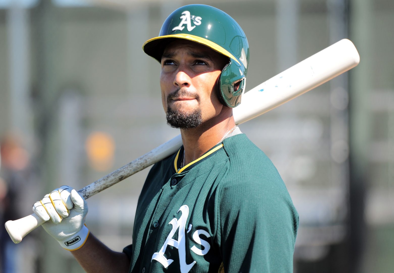 Athletics third baseman Marcus Semien looks on during a workout at Fitch Park in Mesa.