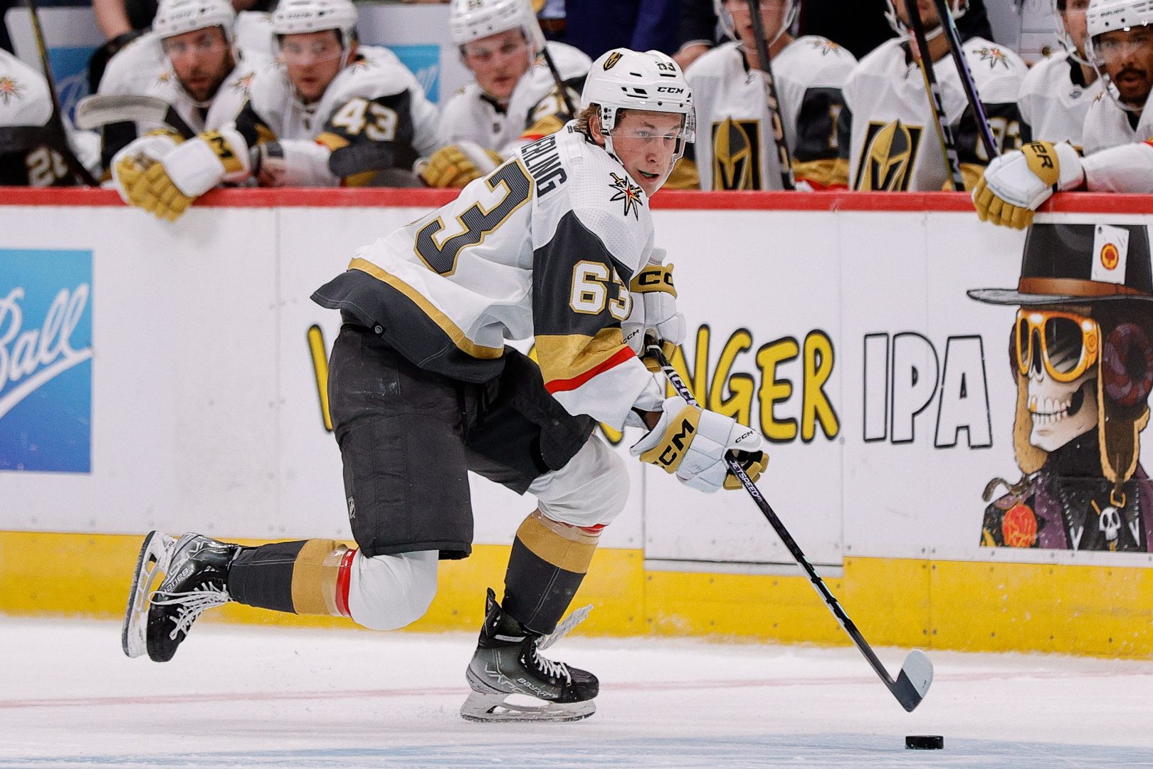 Vegas Golden Knights forward prospect Ben Hemmerling skates with the puck during a game.