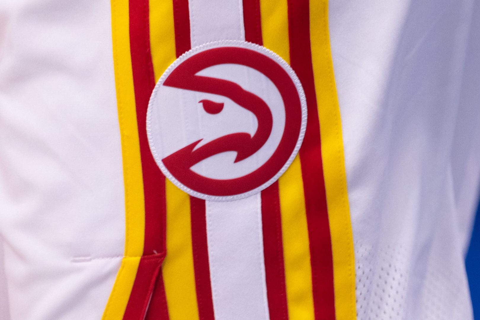 Atlanta Hawks logo patch on a warmup jacket before a game vs. the Pelicans in New Orleans