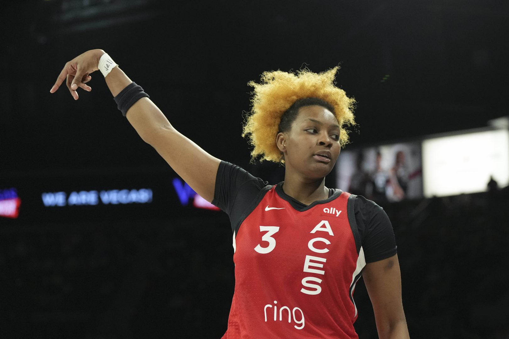 NaLyssa Smith reacts after making a 3-pointer for the Las Vegas Aces at Michelob ULTRA Arena.
