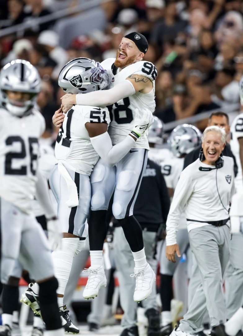 Raiders defensive end Malcolm Koonce celebrates with Maxx Crosby during the 2025 preseason game vs the Cardinals in Glendale, Arizona.