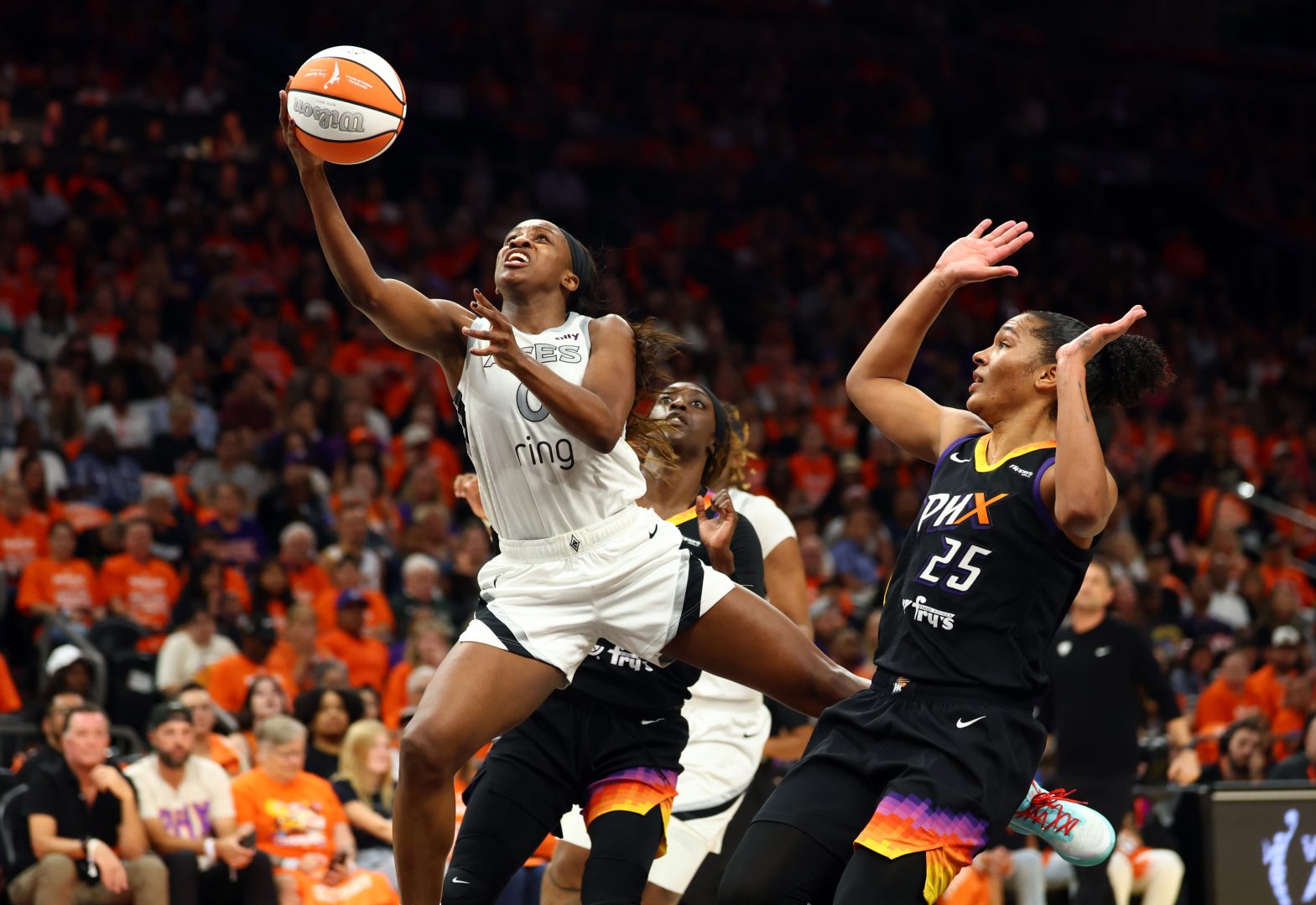 Las Vegas Aces guard Jackie Young shoots a jumper during the 2025 WNBA Finals.