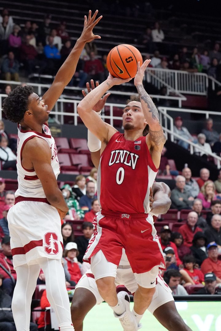 UNLV Runnin' Rebels guard Dra Gibbs-Lawhorn (0) shoots against Stanford Cardinal guard Ebuka Okorie (1) in the second half at Maples Pavilion.