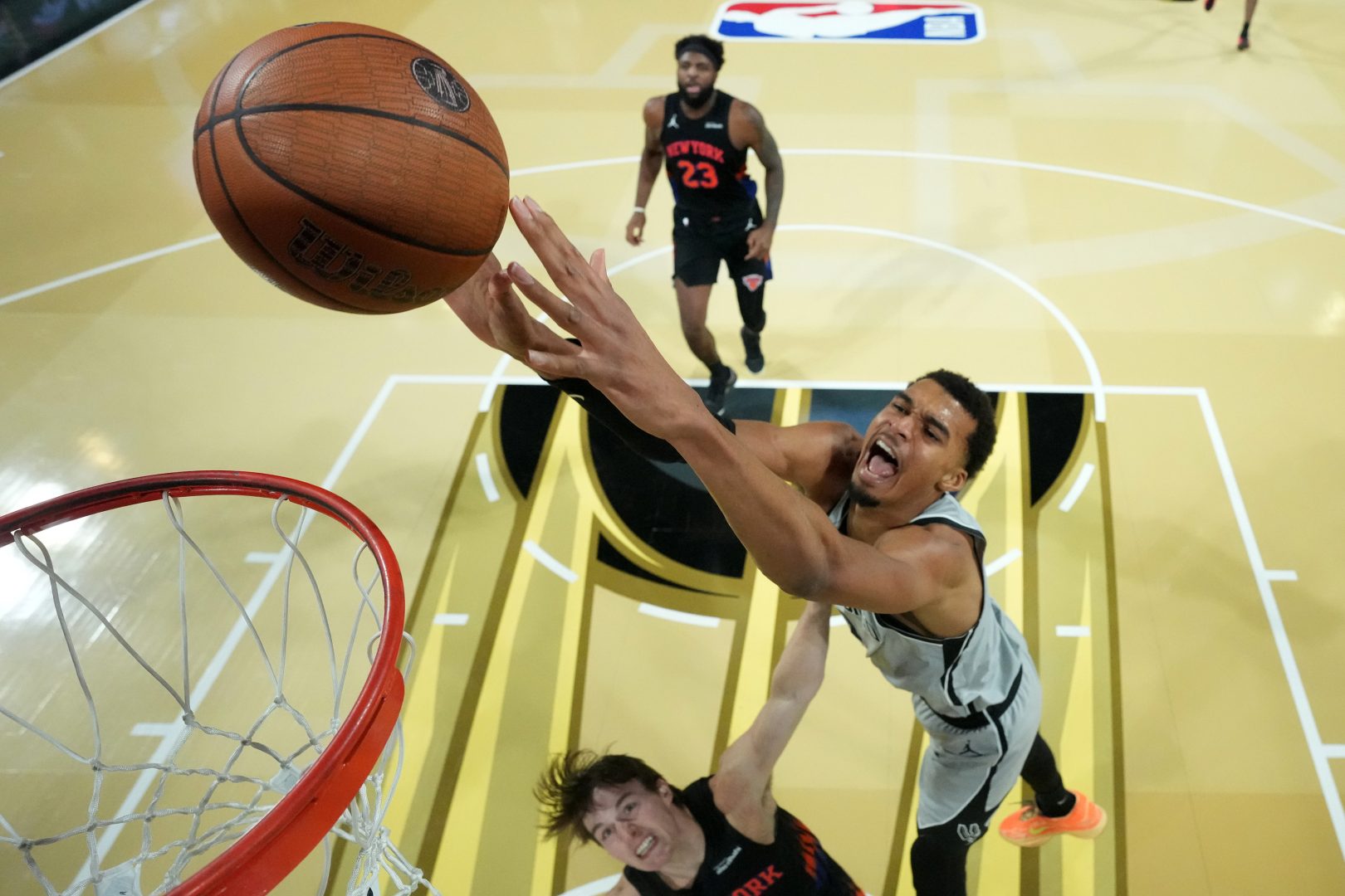 Victor Wembanyama dunks at T-Mobile Arena in Las Vegas during the 2025 Emirates NBA Cup final.