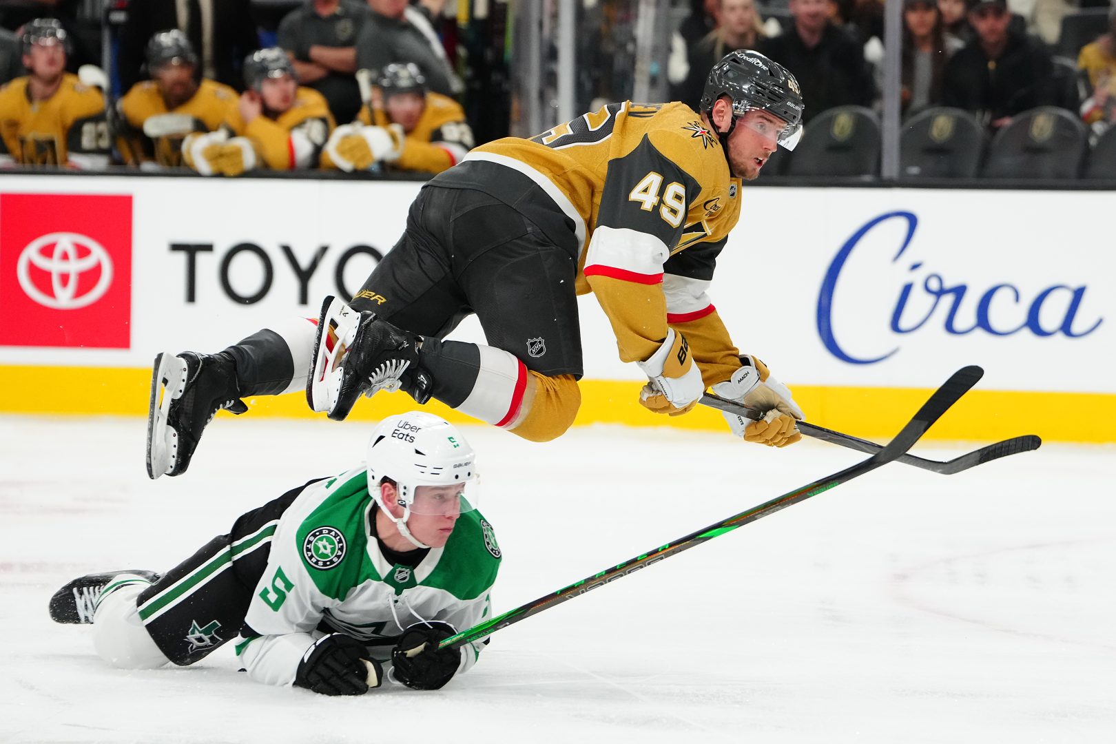 Vegas Golden Knights left wing Ivan Barbashev (49) falls to the ice after tripping over Dallas Stars defenseman Nils Lundkvist (5) during the second period at T-Mobile Arena on Jan. 29, 2026.