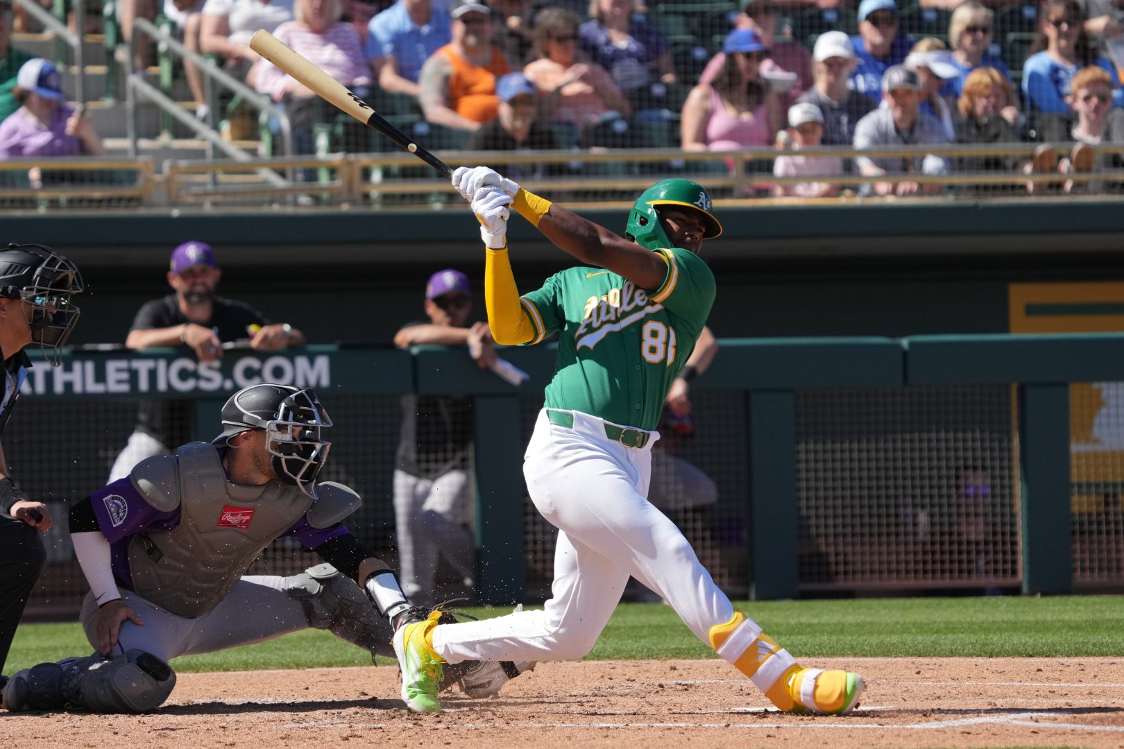 Athletics shortstop Leo De Vries swings at a pitch against the Colorado Rockies during the second inning at Hohokam Stadium in Mesa, Arizona, on March 6, 2026.