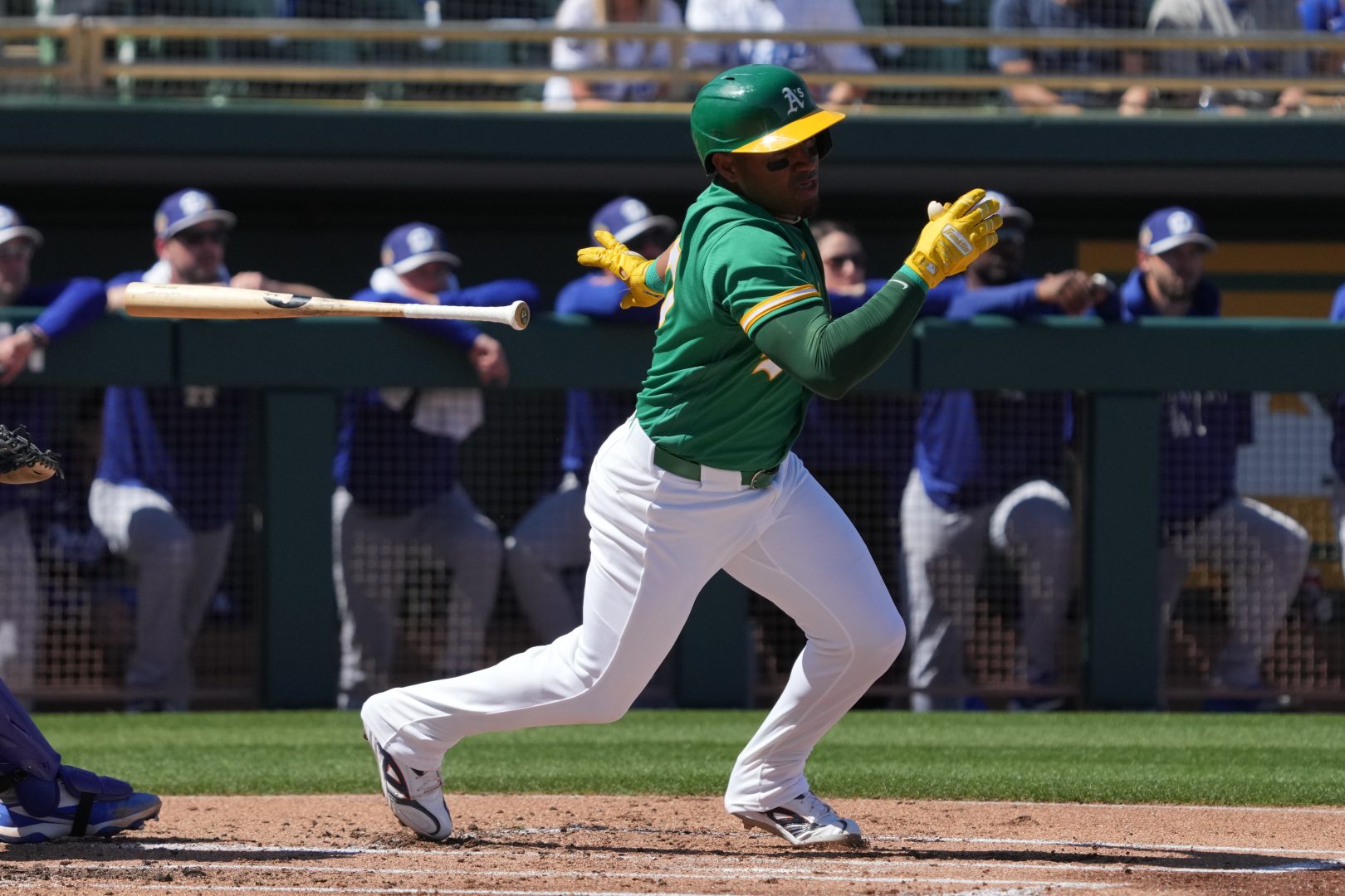 Athletics third baseman Andy Ibáñez hits a double against the Los Angeles Dodgers during the first inning at Hohokam Stadium in Mesa, Arizona.