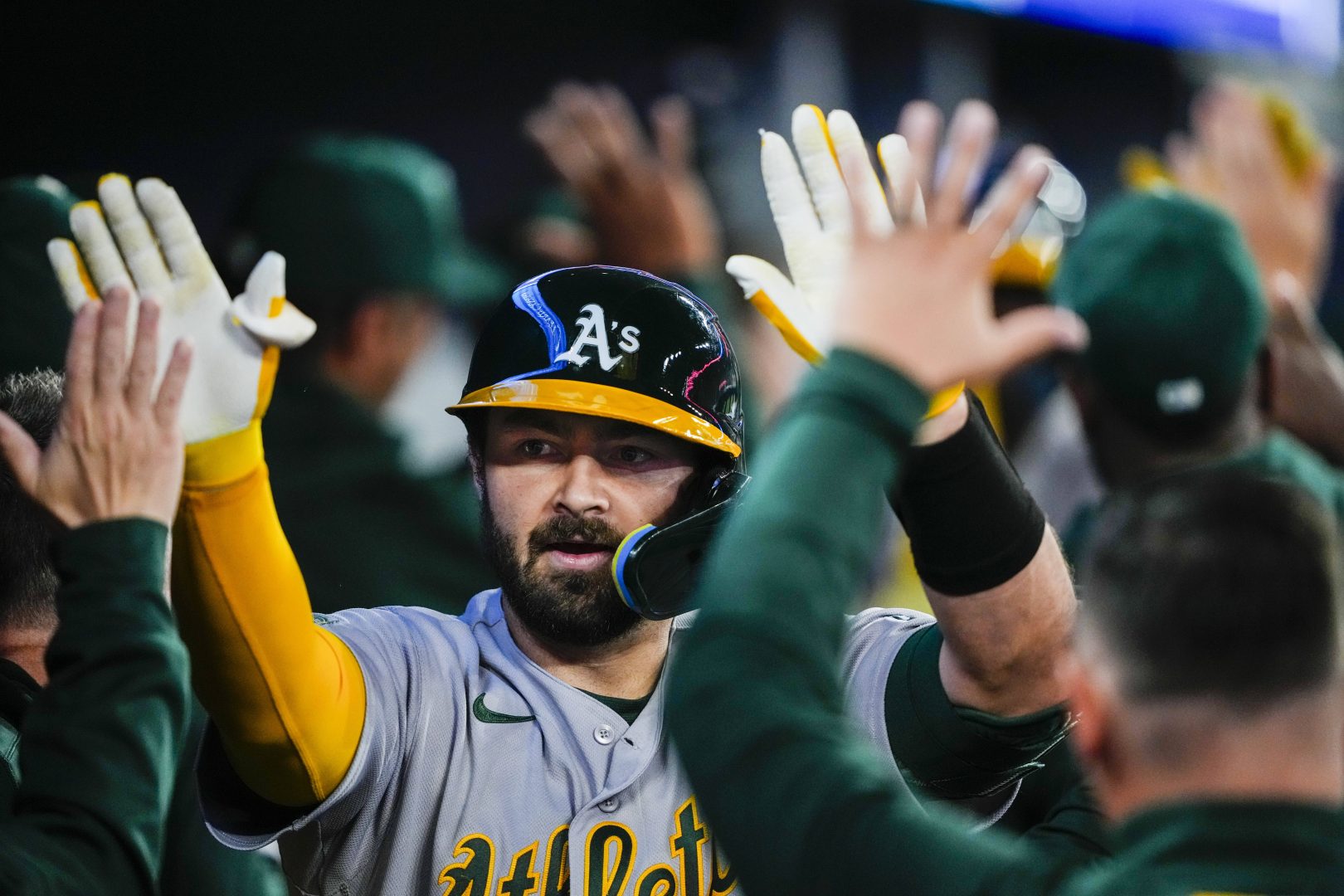 Shea Langeliers celebrates after hitting a grand slam against the Blue Jays during Opening Day weekend in Toronto