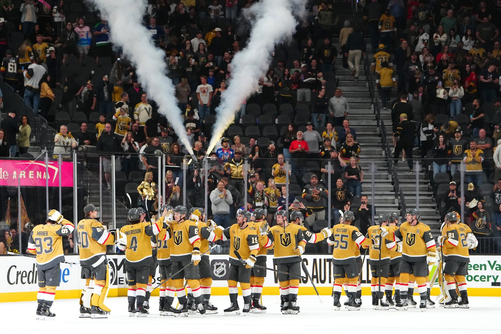 Vegas Golden Knights players celebrate after a 4-2 win over the Vancouver Canucks at T-Mobile Arena on March 30, 2026.