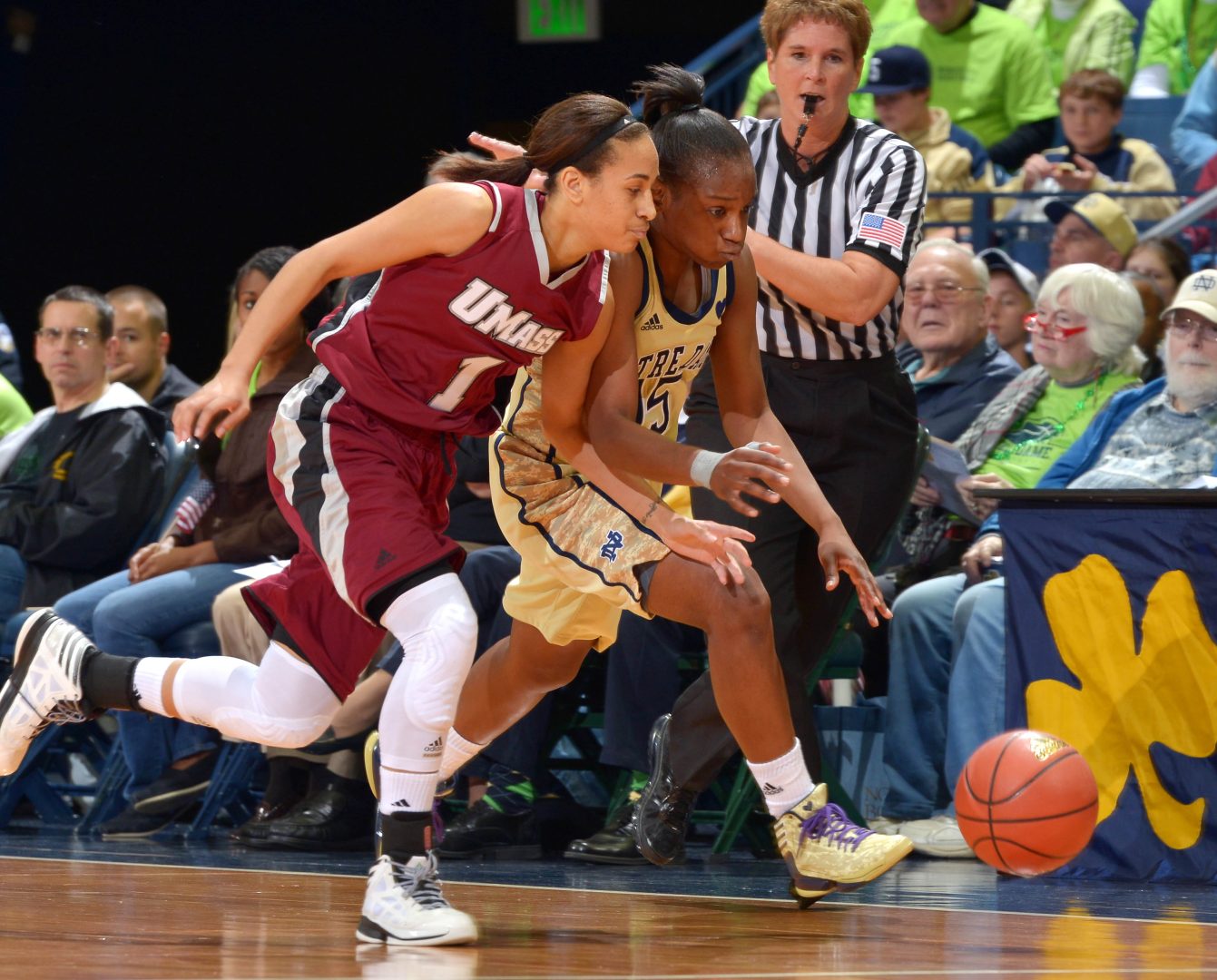 Nola Henry (Massachusetts) and Notre Dame’s Kaila Turner chase a loose ball in a 2012 game at Purcell Pavilion.