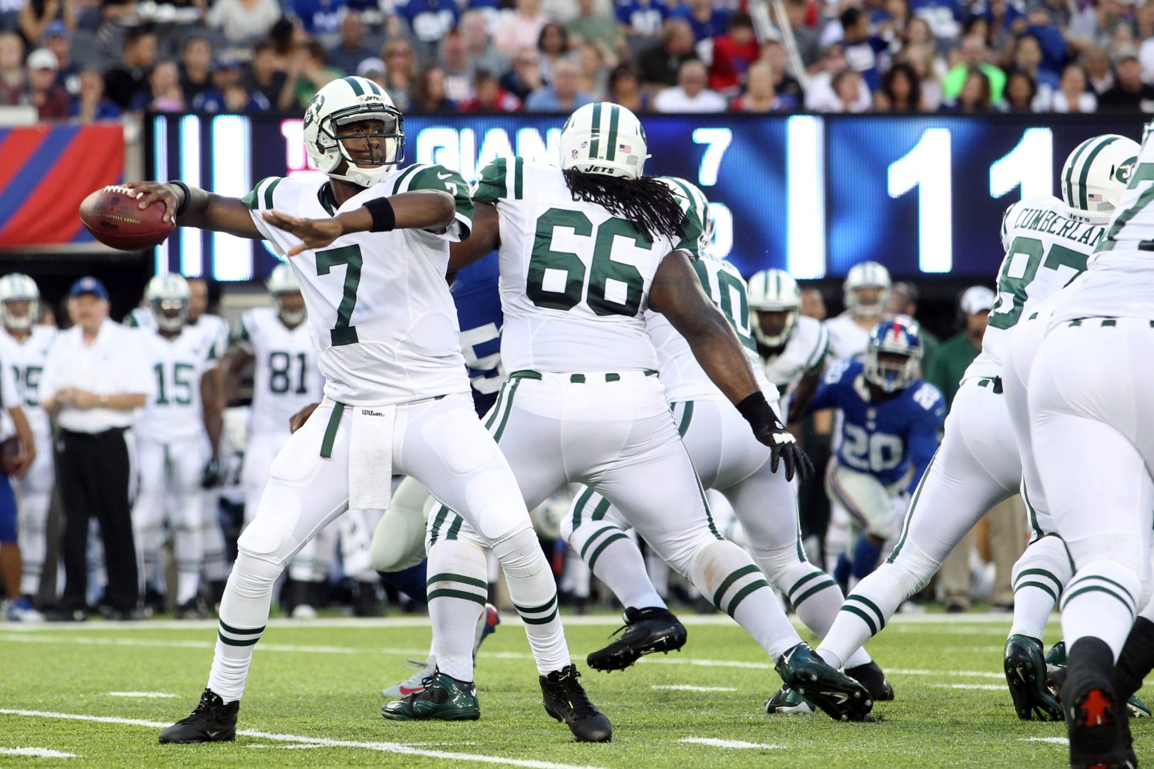 New York Jets quarterback Geno Smith drops back to pass during a 2013 preseason game against the New York Giants at MetLife Stadium, as the Raiders trade sends him back to the franchise that drafted him.