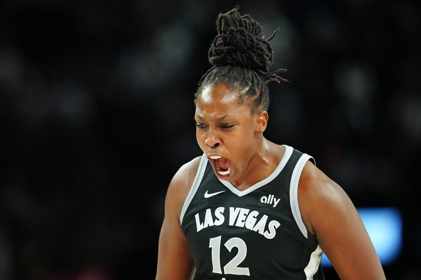 Chelsea Gray celebrates after making a play for the Las Vegas Aces against the Indiana Fever during the 2025 WNBA Playoffs.