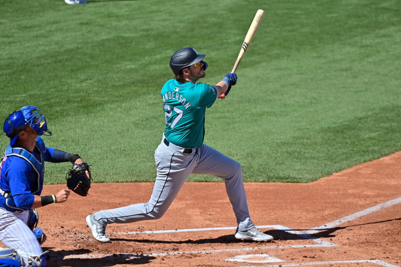 Cade Marlowe, pictured during 2024 Spring Training with the Seattle Mariners, flies out against the Chicago Cubs at Sloan Park.