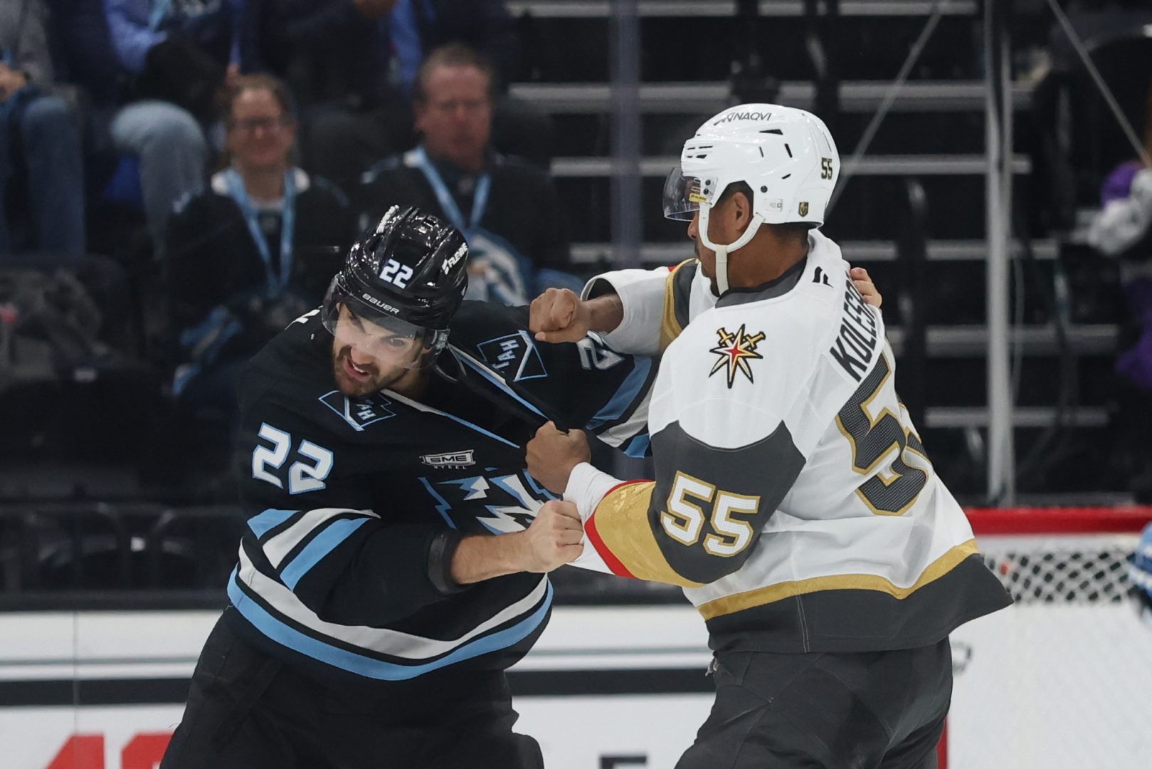 Vegas Golden Knights forward Keegan Kolesar fights Utah Mammoth center Jack McBain during a third-period scrum at Delta Center in a regular-season game.