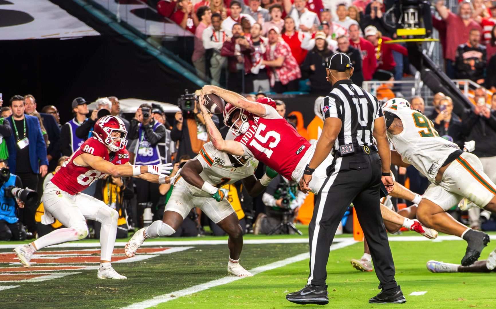 Indiana QB Fernando Mendoza runs in a touchdown in the CFP National Championship game at Hard Rock Stadium.