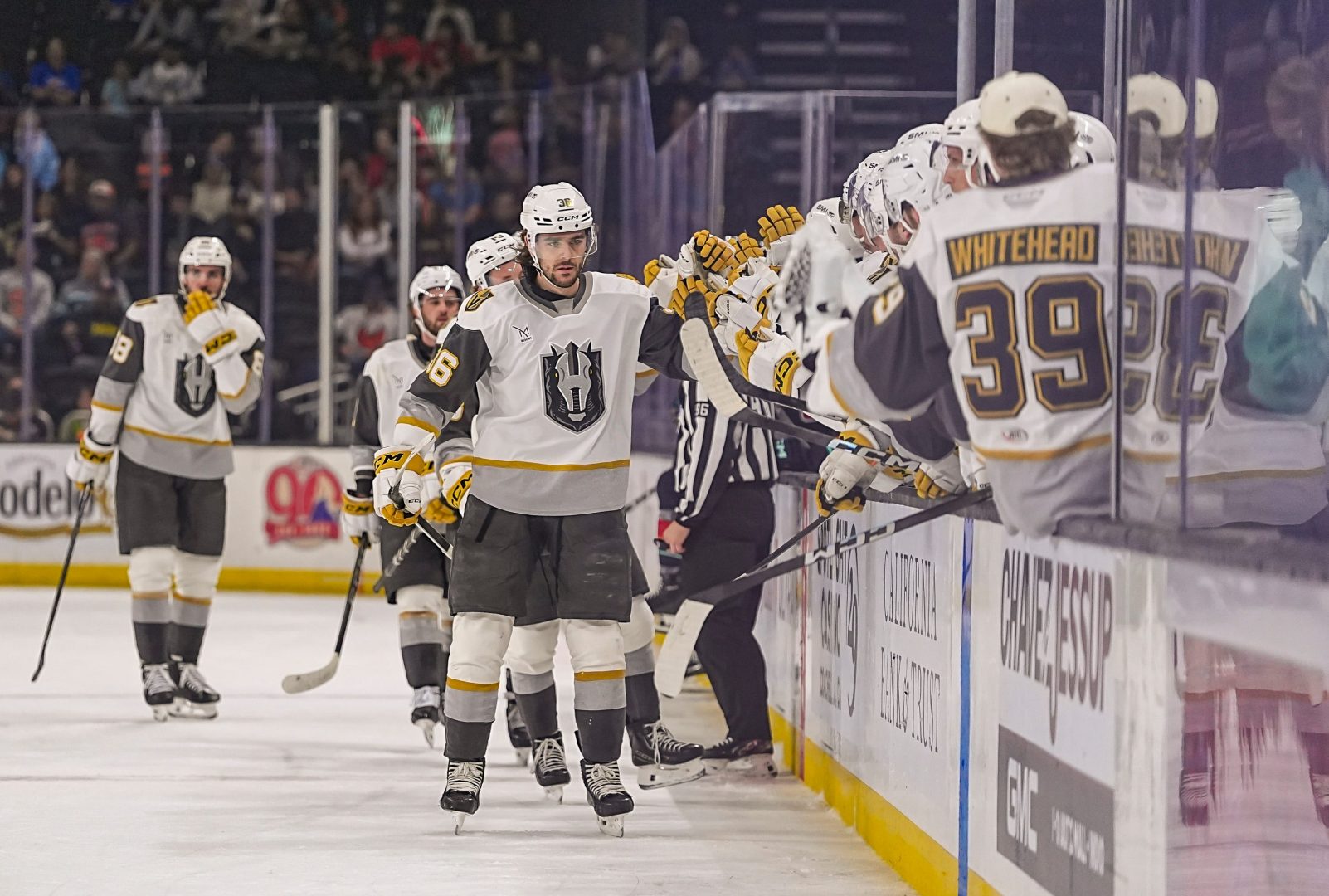 Henderson Silver Knights forward Raphael Lavoie high-fives the bench after a first-period goal at Acrisure Arena on Feb. 26, 2026.