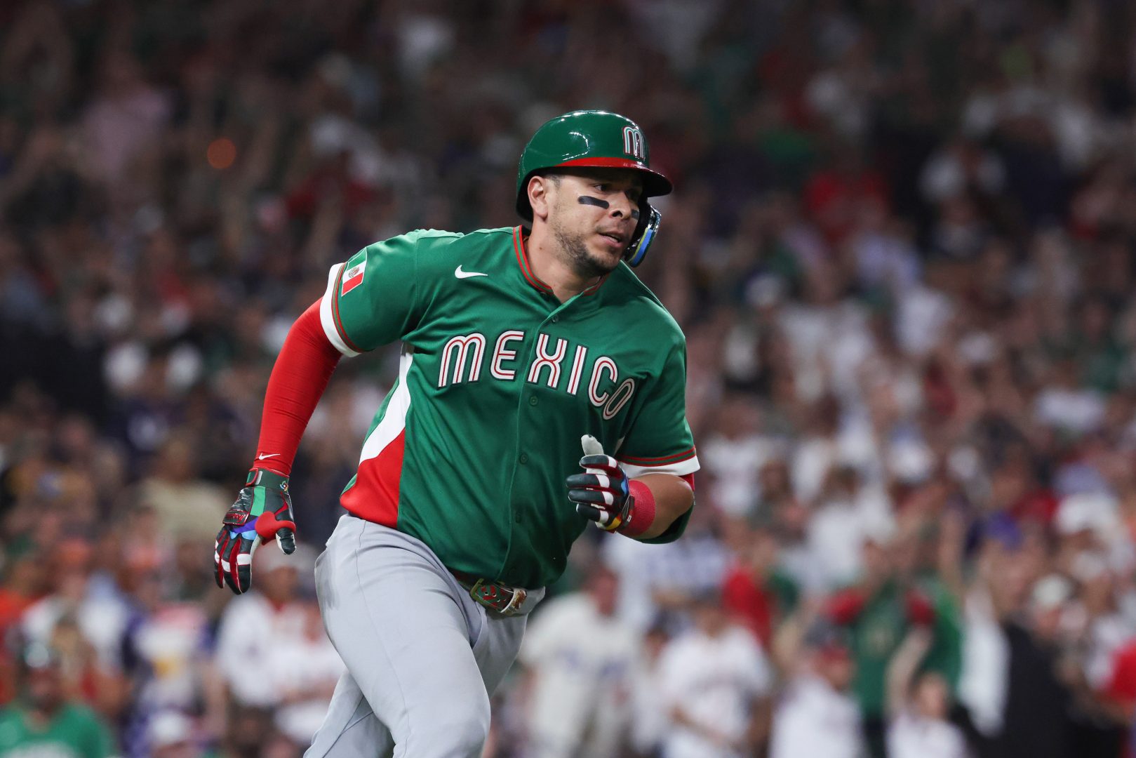 Joey Meneses, wearing a Team Mexico jersey, runs the bases during international play prior to his walk-off performance for the Las Vegas Aviators.
