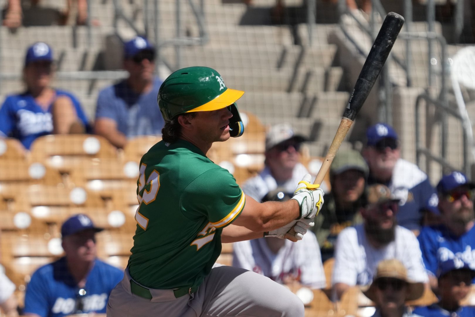 Colby Thomas, pictured in Spring Training with the Athletics, hits a double against the Los Angeles Dodgers on March 21, 2026 at Camelback Ranch-Glendale in Phoenix.