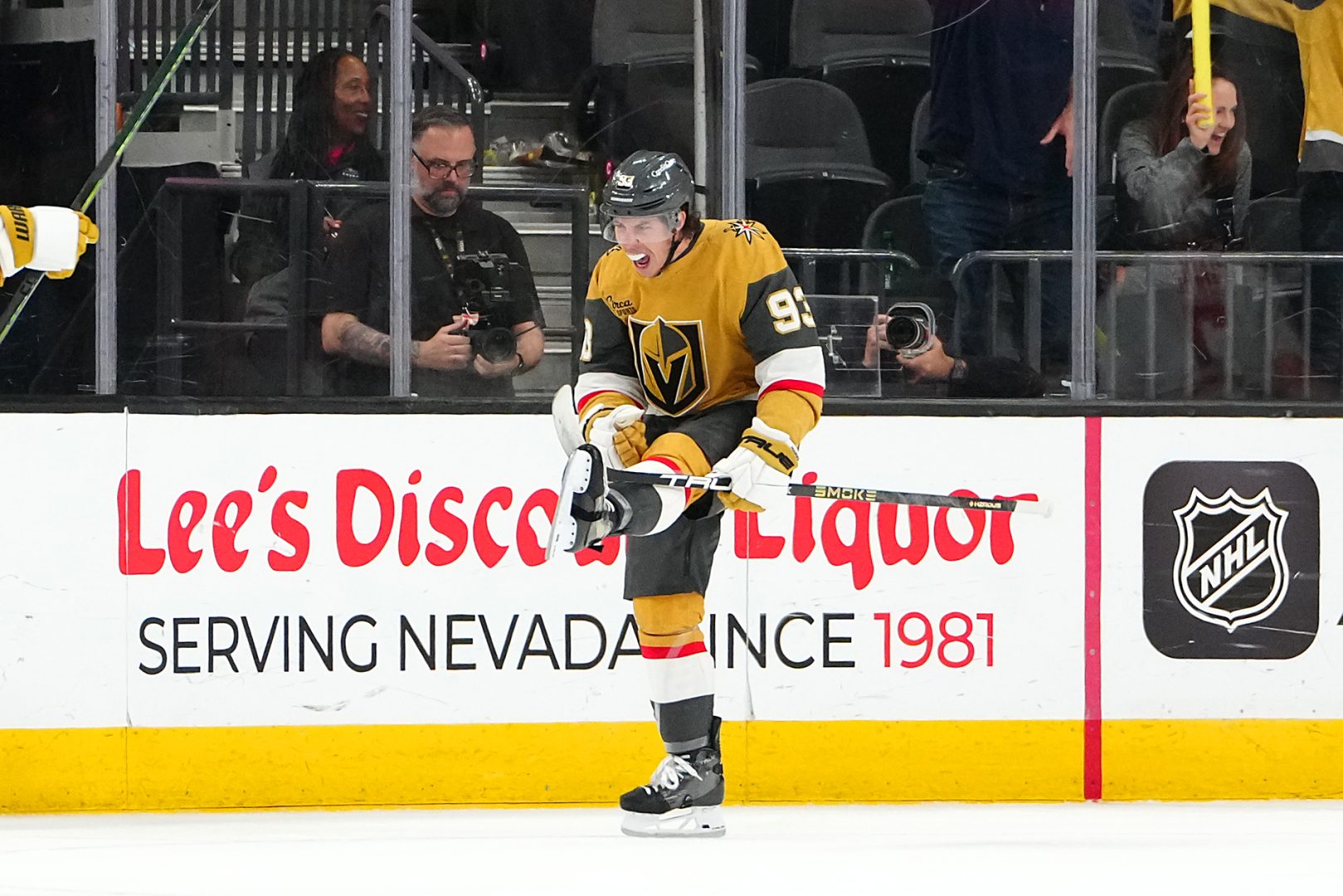 Mitch Marner celebrates after completing a hat trick against the Calgary Flames during the third period at T-Mobile Arena on April 2, 2026.