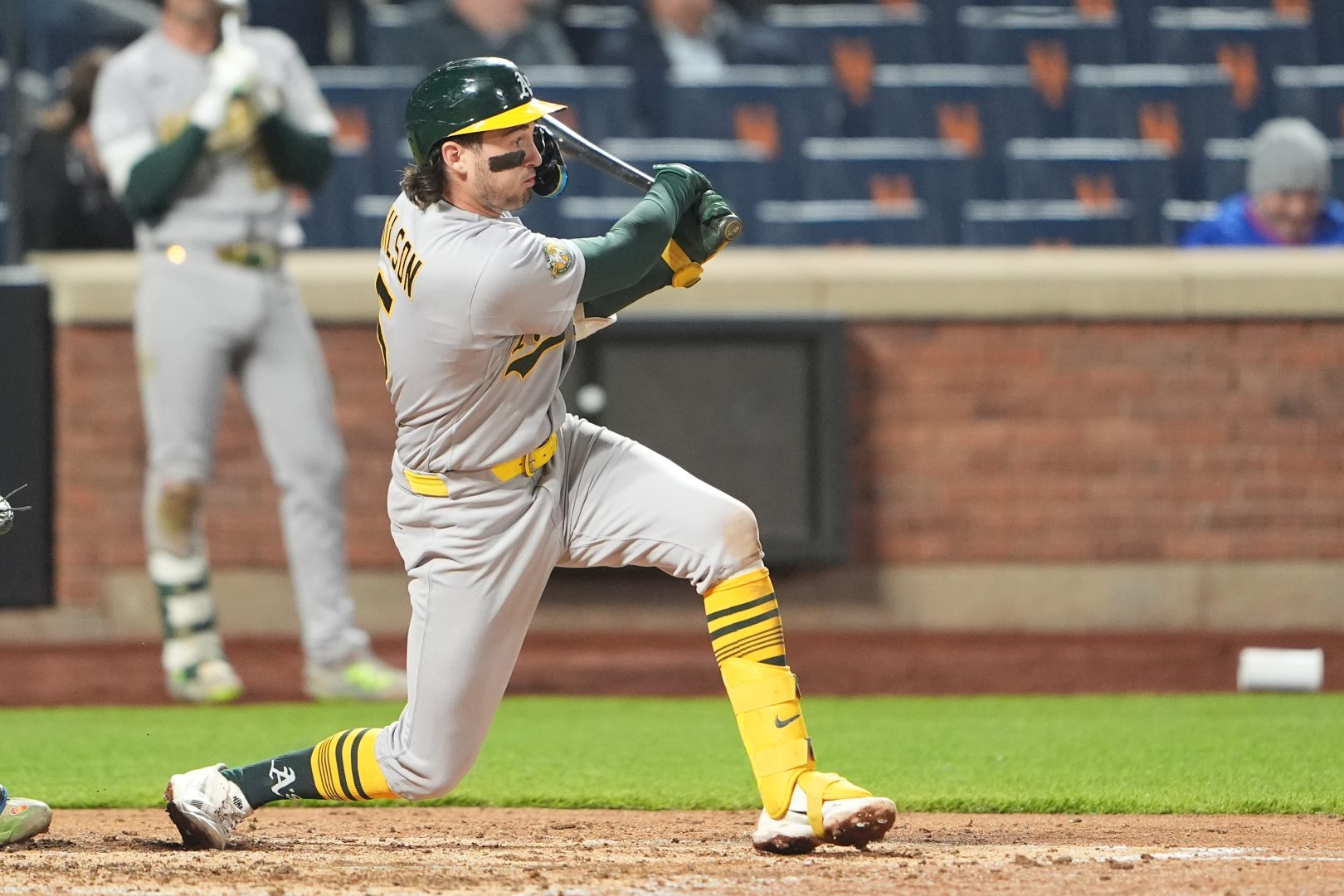 Athletics shortstop Jacob Wilson lines a single during the sixth inning against the Mets at Citi Field.
