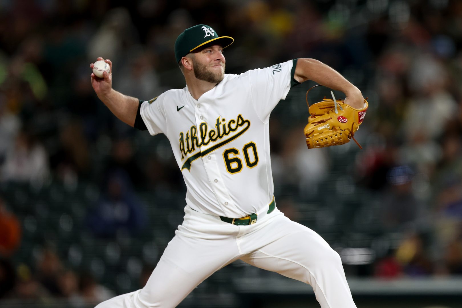 Athletics pitcher Justin Sterner throws during the seventh inning against the Texas Rangers at Sutter Health Park.