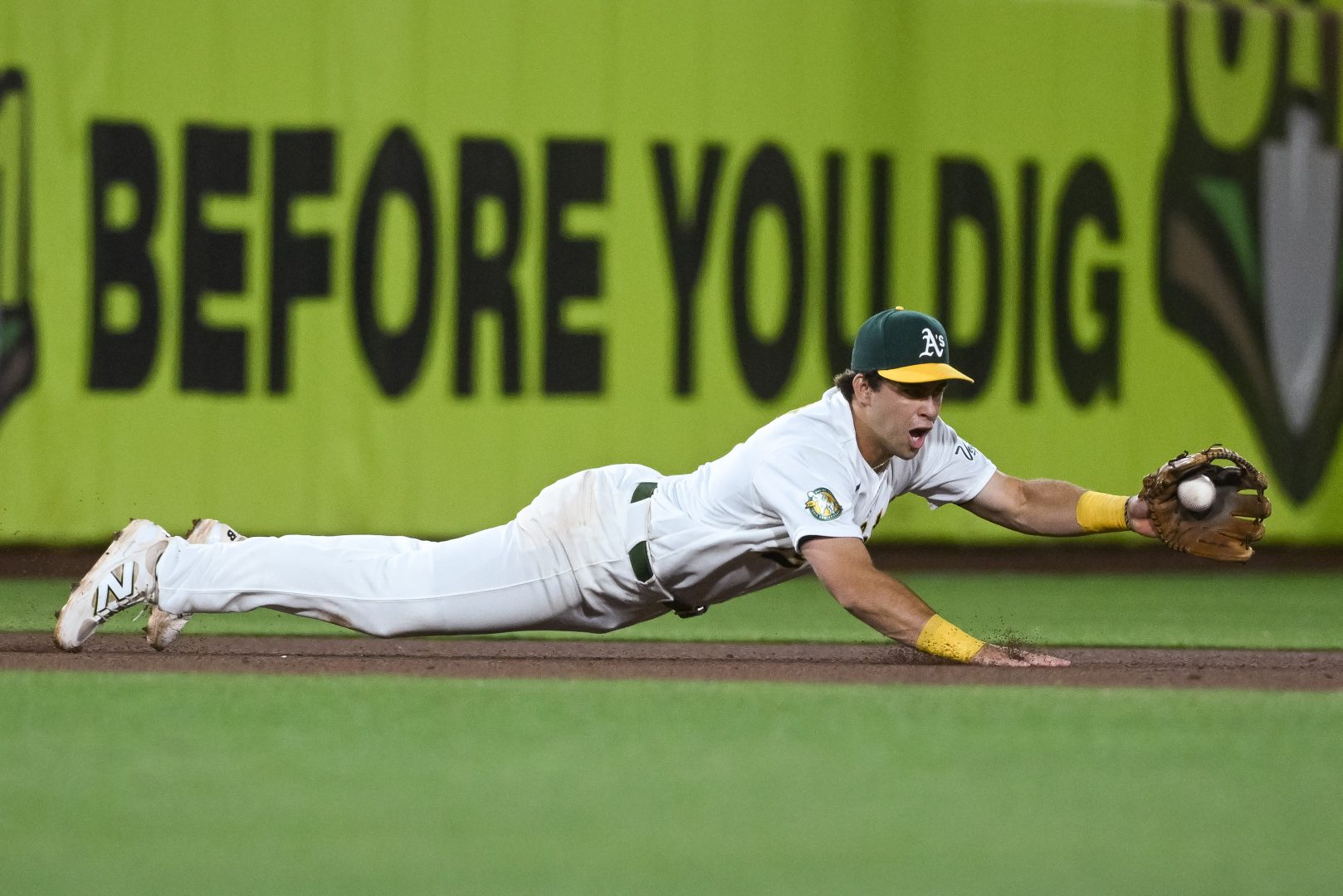 Max Muncy dives for a ground ball at third base during the Athletics game against the White Sox on April 17, 2026, at Sutter Health Park.