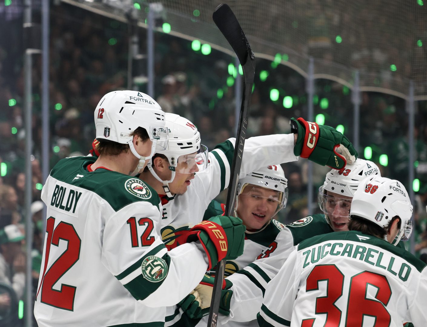 Joel Eriksson Ek celebrates after his first-period goal as Minnesota pulls away from Dallas in Game 1.