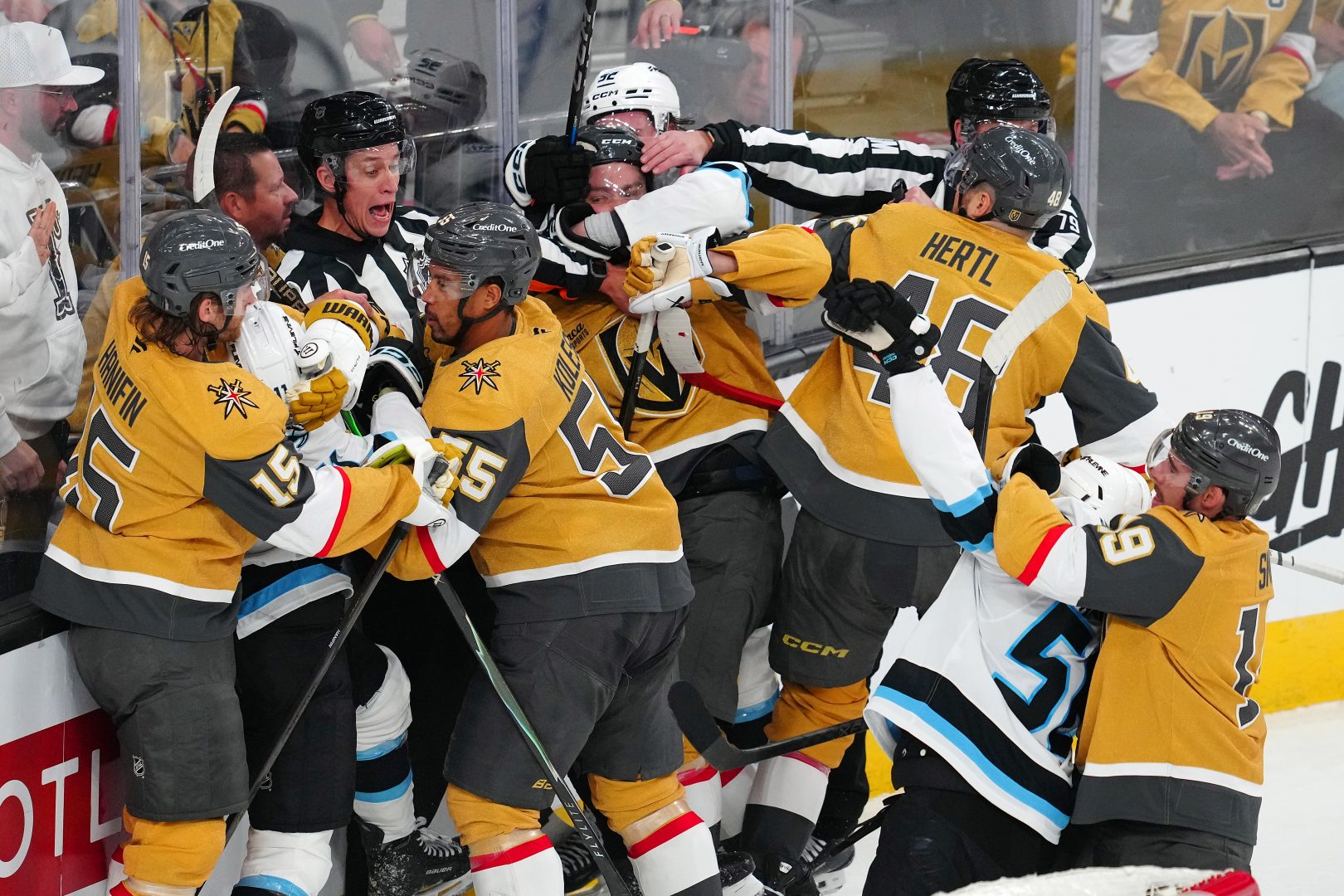 Golden Knights and Mammoth players battle in a third-period scrum during Game 1 at T-Mobile Arena.