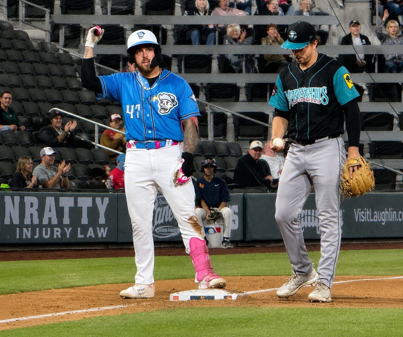 Tommy White stands on third base after hitting an RBI triple during a Las Vegas Aviators home game.