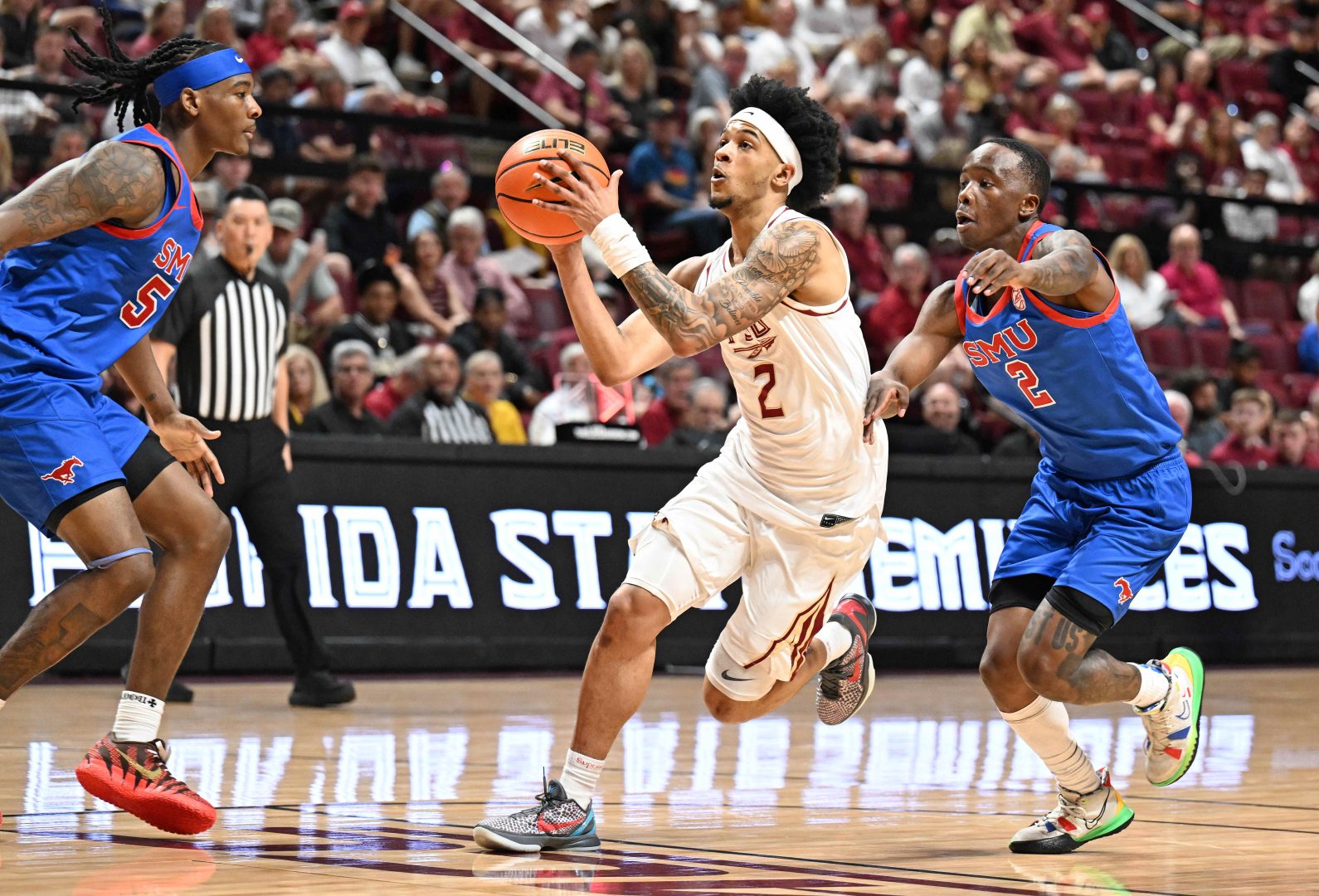 Florida State guard Cam Miles goes up for a shot against SMU during the 2025-26 season before transferring to UNLV.