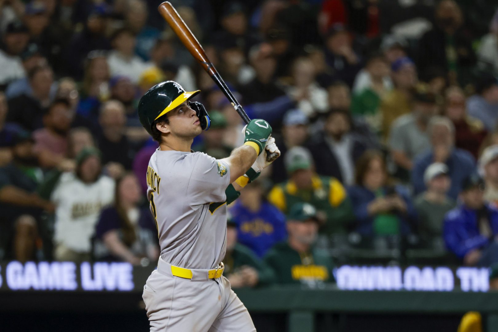 Athletics infielder Max Muncy hits a sacrifice fly during the eighth inning against the Seattle Mariners at T-Mobile Park on April 20, 2026.