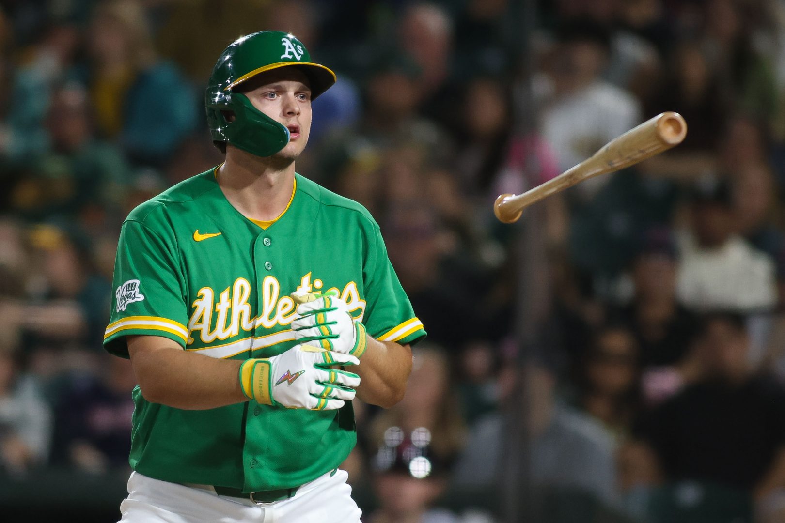 Nick Kurtz flips his bat after drawing a walk in the seventh inning against the Guardians at Sutter Health Park